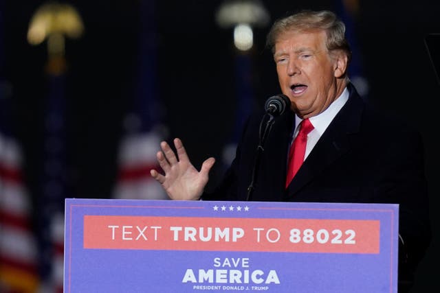 <p>Former President Donald Trump speaks at a campaign rally in support of the campaign of Ohio Senate candidate JD Vance at Wright Bros. Aero Inc. at Dayton International Airport on Monday, Nov. 7, 2022, in Vandalia. (AP Photo/Michael Conroy)</p>