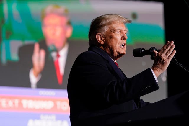 <p>Former President Donald Trump speaks at a campaign rally in support of the campaign of Ohio Senate candidate JD Vance at Wright Bros. Aero Inc. at Dayton International Airport on 7 Nov 2022</p>