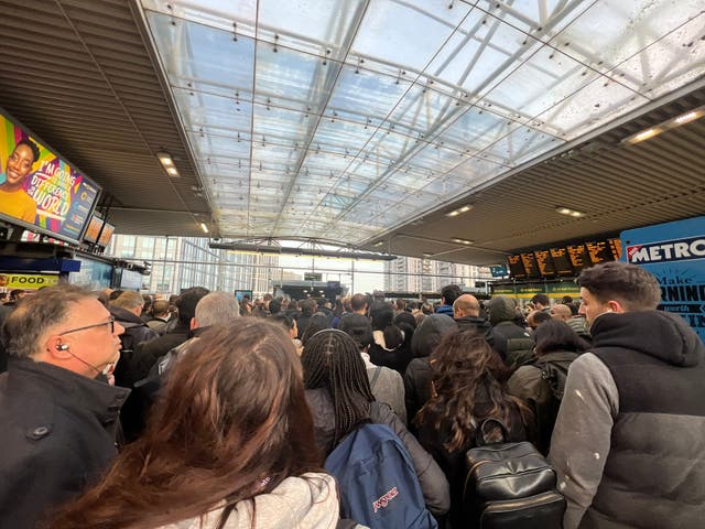 <p>Commuters at East Croydon station on Tuesday morning</p>