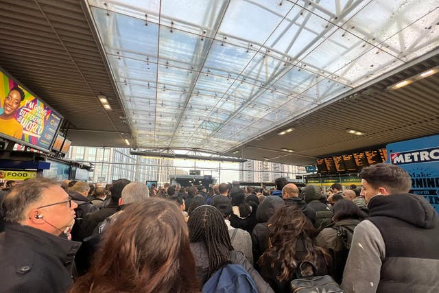 <p>Commuters at East Croydon station on Tuesday morning</p>