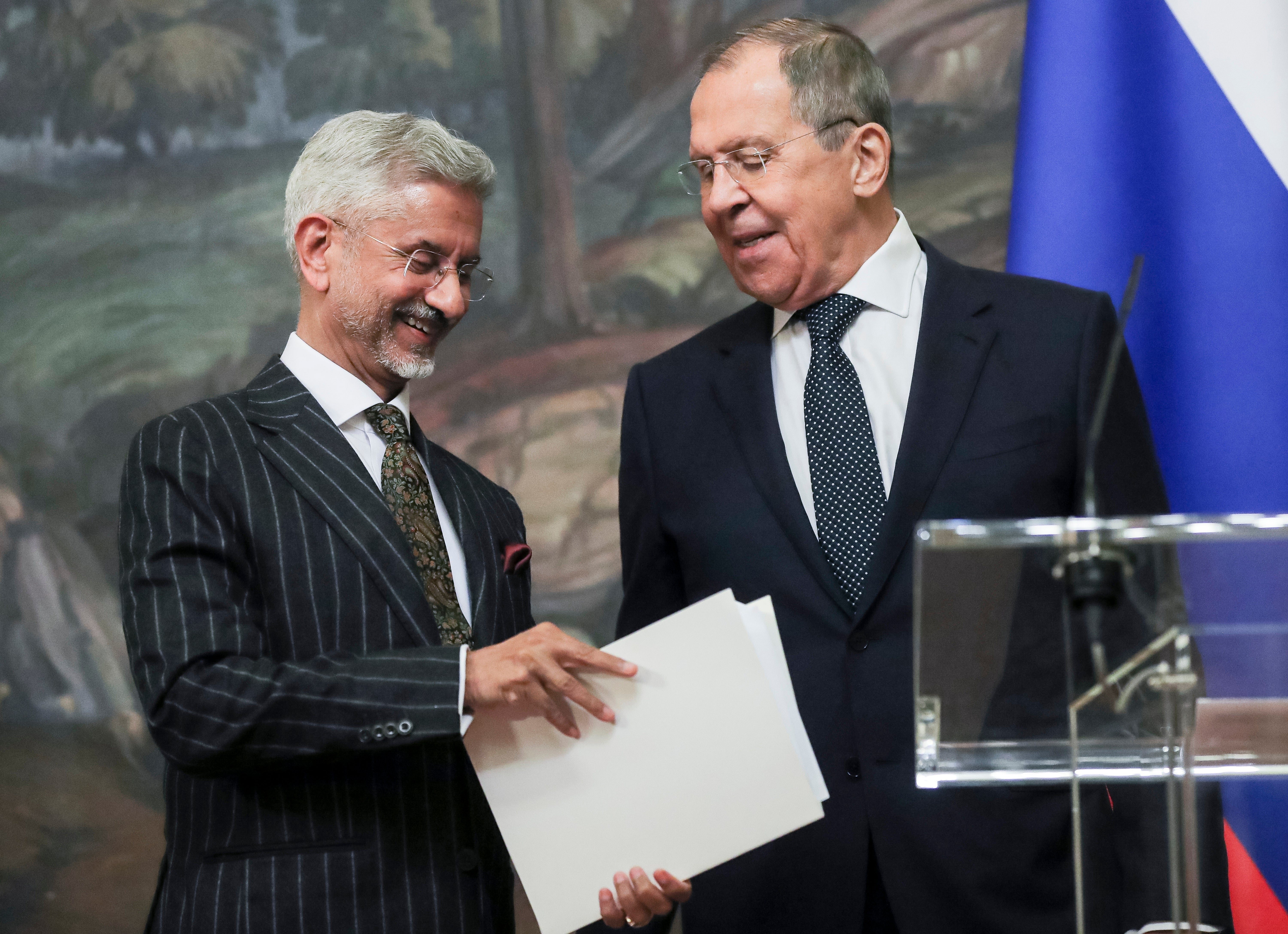 Indian foreign minister Subrahmanyam Jaishankar, left, and Russian Foreign Minister Sergey Lavrov talk to each other after a joint news conference following their talks in Moscow, Russia