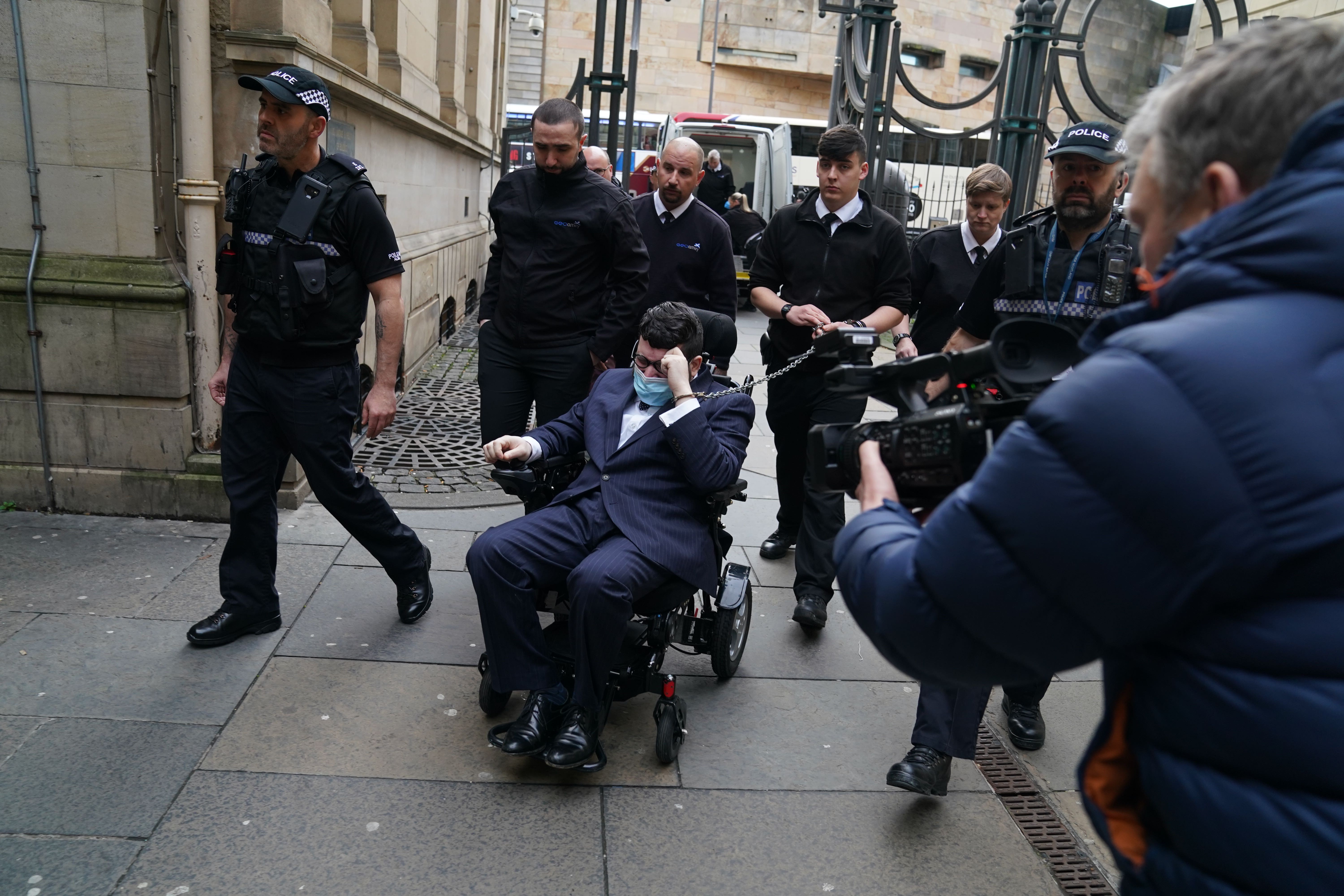 The man, who claims to be called Arthur Knight but whom US authorities say is Nicolas Rossi, arrives at court (Jane Barlow/PA)