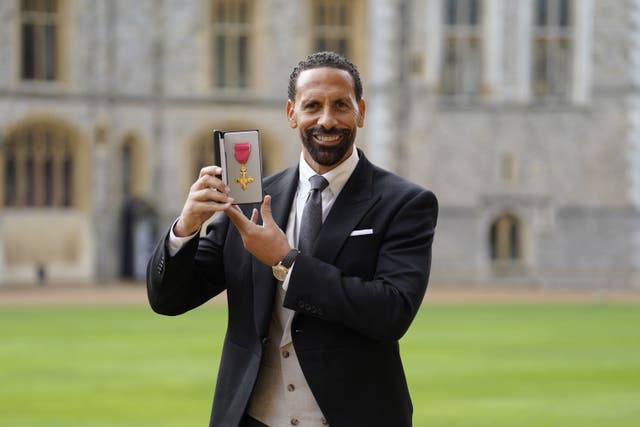 Rio Ferdinand was made an OBE at Windsor Castle (PA)