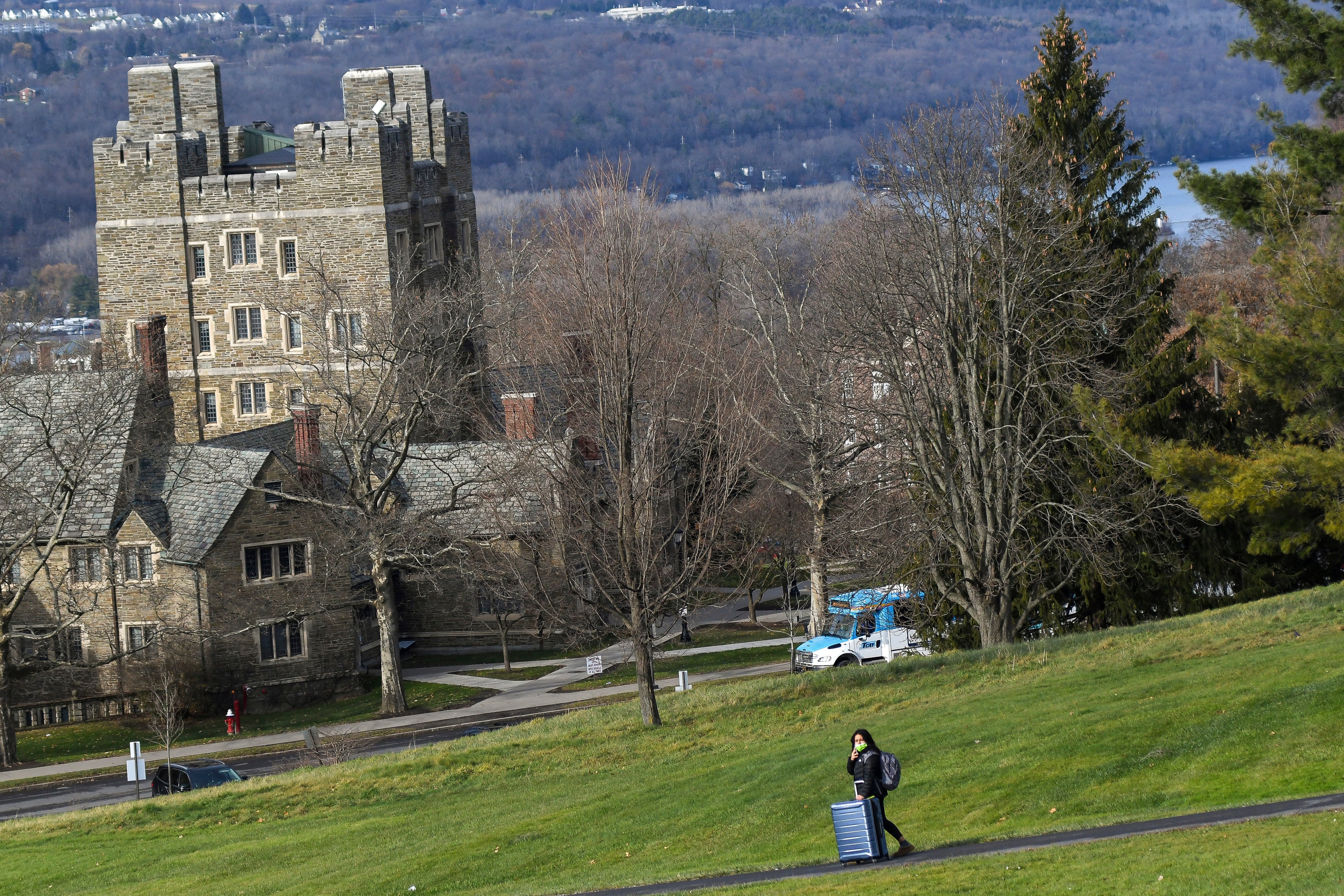 A Cornell University student walks along the campus in Ithaca, N.Y., on Dec. 16, 2021