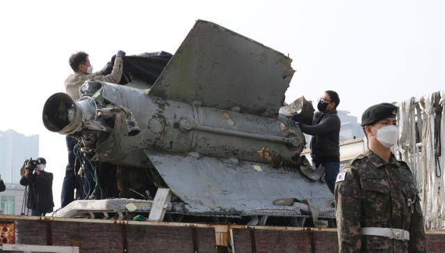 <p>The debris of a missile which the Defense Ministry identified as a North Korea's SA-5 surface-to-air missile, is unveiled at the Defense Ministry in Seoul, South Korea</p>