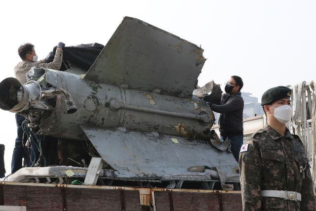 <p>The debris of a missile which the Defense Ministry identified as a North Korea's SA-5 surface-to-air missile, is unveiled at the Defense Ministry in Seoul, South Korea</p>