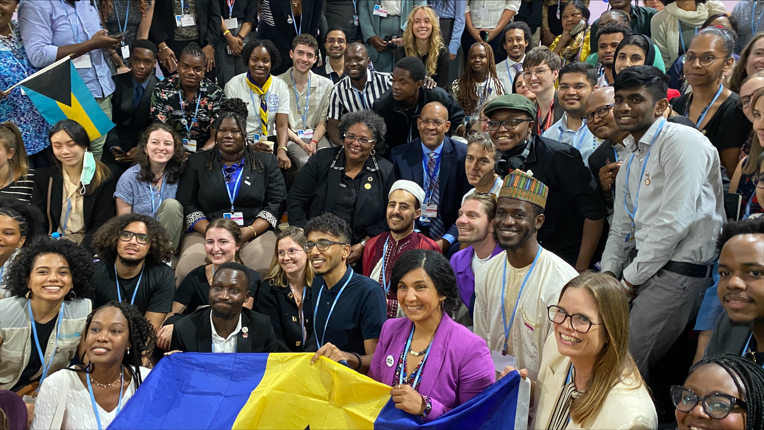 <p>Barbados Prime Minister Mia Mottley with young climate activists at Cop27 in Sharm el-Sheikh, Egypt</p>