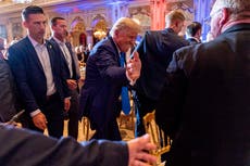 Trump news – live: DeSantis declared ‘new leader of GOP’ as awkward party photos emerge from Mar-a-Lago
