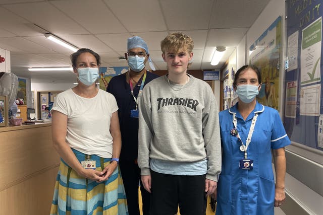 Warrick Allon (second right) with (left to right) Georgina Bird-Lieberman, Neurosurgeon Aabir Chakraborty, and Shona Mackie. Warrick, 15, made a ‘miraculous’ recovery after he was rushed into emergency surgery at Southampton Children’s Hospital (SCH) when he collapsed and became unresponsive whilst complaining of a headache at his home in Andover, Hampshire, in April (University Hospital Southampton/PA)