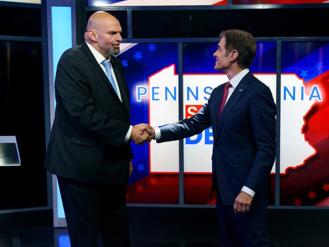 <p>John Fetterman (L) and Mehmet Oz</p>