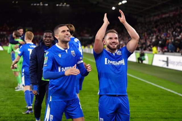 Gillingham’s Alex MacDonald and Stuart O’Keefe (left) celebrate beating Brentford (John Walton/PA)