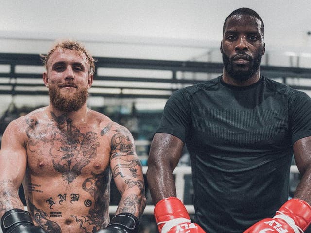 <p>YouTube star Jake Paul (left) with WBO cruiserweight champion Lawrence Okolie</p>