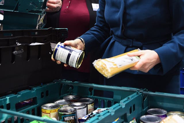 Figures from the Trussell Trust reveal huge increases in the number of emergency supplies handed out at food banks (Andy Buchanan/PA)