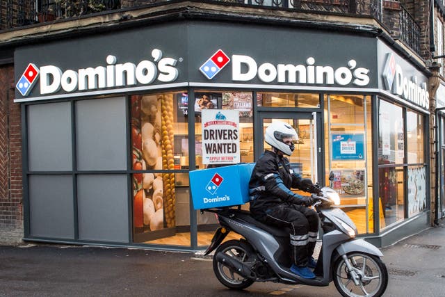 Domino’s said the Just Eat partnership has helped boost recent trading (PA)