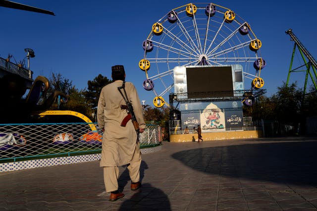 <p>File. A Taliban fighter stands guard in an amusement park, in Kabul, Afghanistan, Thursday, 10 November 2022. The Taliban have banned women from using gyms and parks. -A Supreme Court official has confirmed that 10 men and 9 women were lashed in a northeast province for their ‘crimes’ </p>