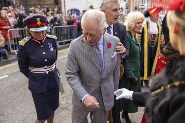 Charles reacts after an egg was thrown in his direction as he arrived for a ceremony at Micklegate Bar in York (The Times/PA)