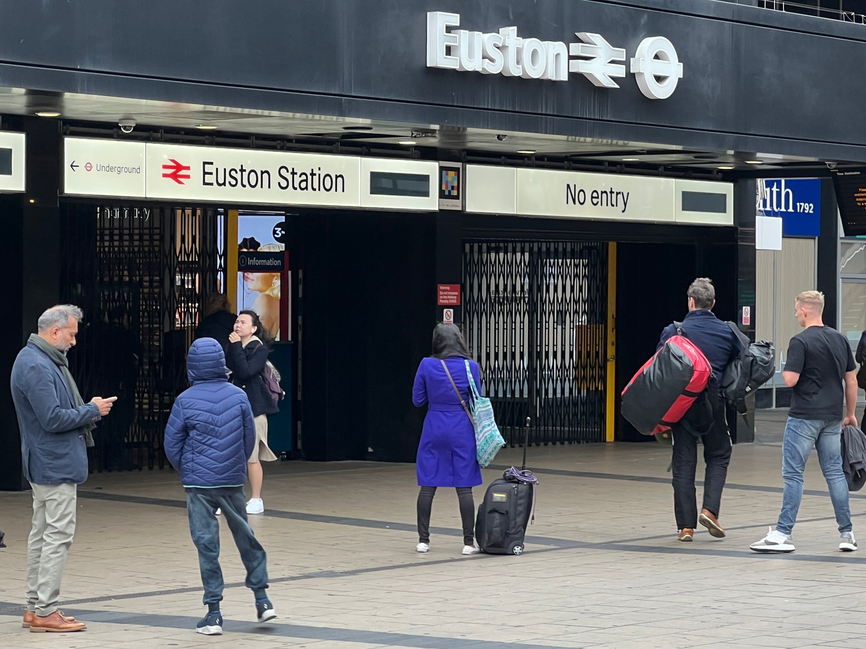 Stay put: Passengers outside London Euston station on the day of the previous drivers’ strike, 5 October 2022
