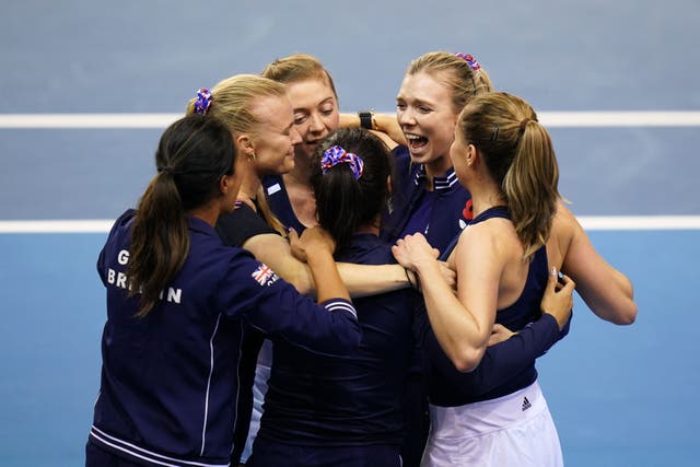 The Great Britain team celebrate their incredible victory over Spain (Jane Barlow/PA)