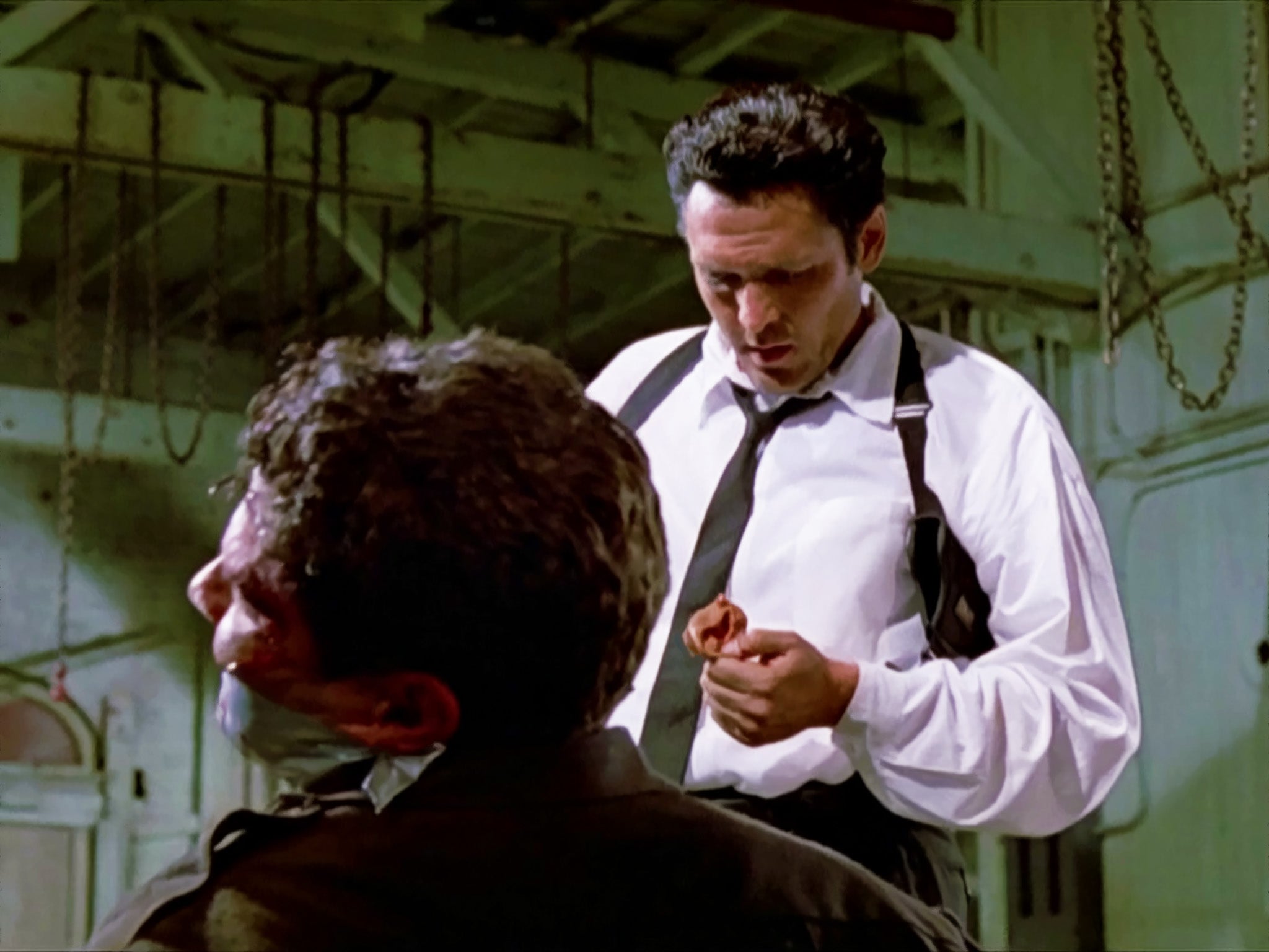 Michael Madsen as Mr Blonde in Quentin Tarantino’s ‘Reservoir Dogs’ in 1992 – he slices off a cop’s ear
