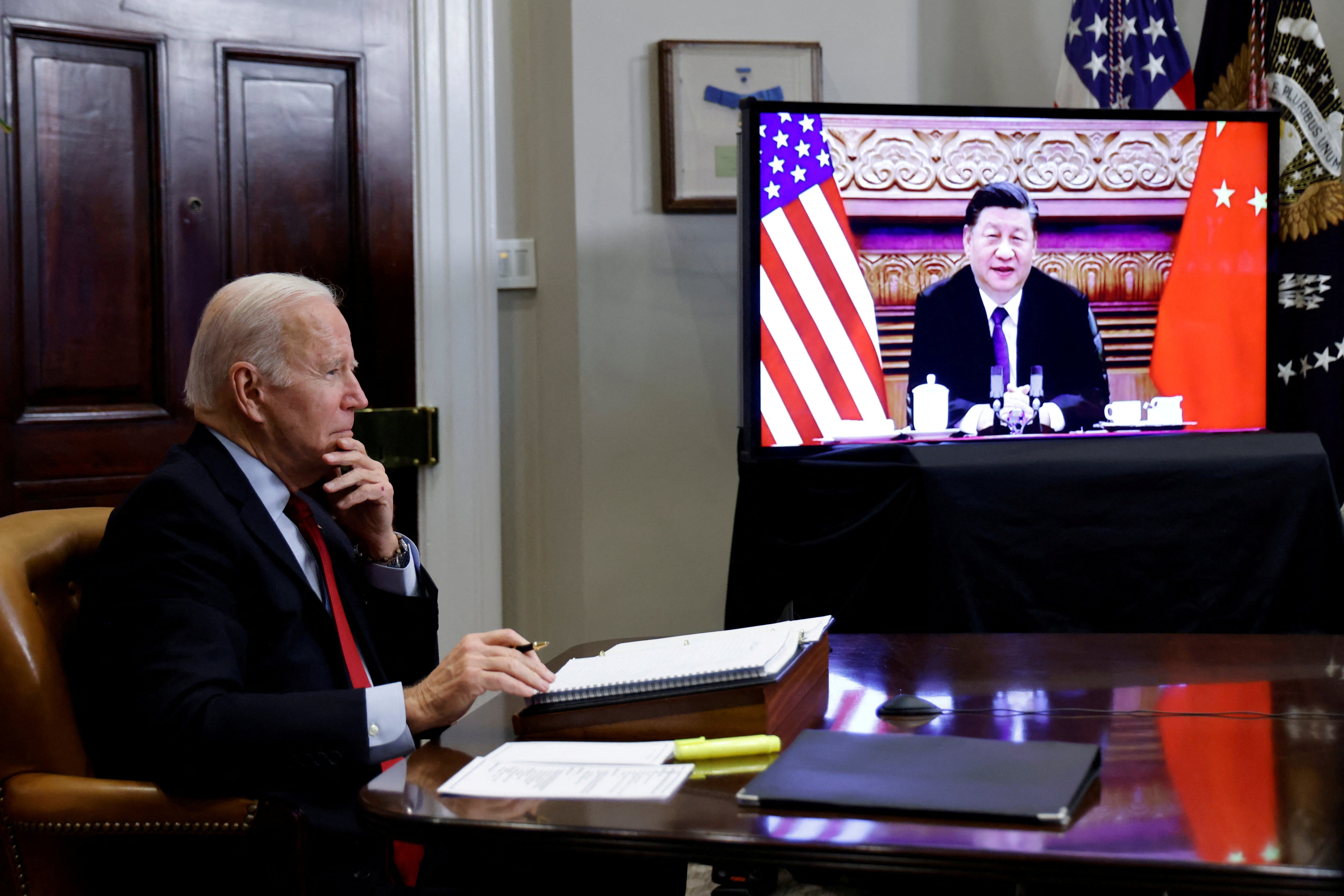 Joe Biden speaks virtually with Chinese leader Xi Jinping from the White House in Washington 15 November 2021