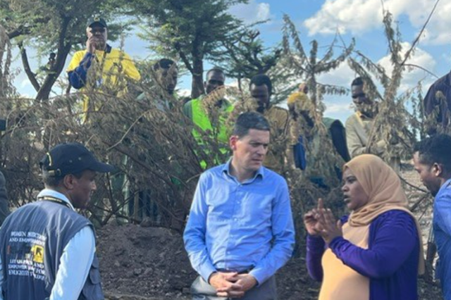 <p>President of the International Rescue Committee, David Miliband, speaking with community representatives in eastern Ethiopia</p>