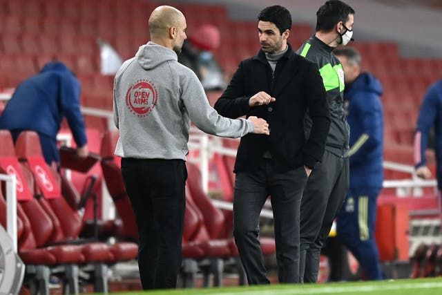 Pep Guardiola and Mikel Arteta are vying for top spot (Shaun Botterill/PA)