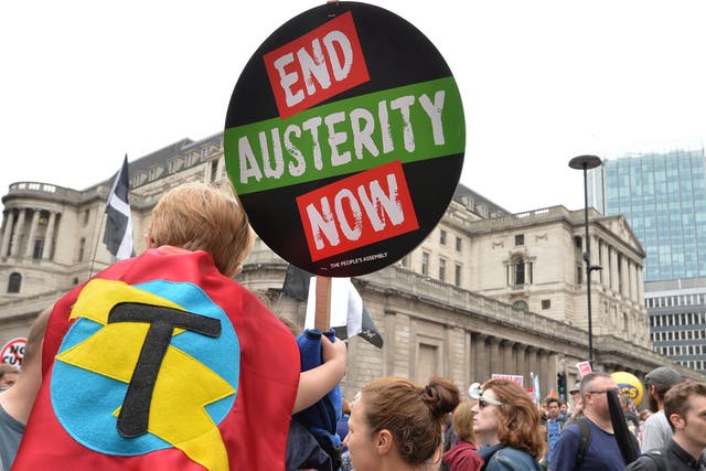 <p>Protesters attend the End Austerity Now rally outside the Bank of England</p>