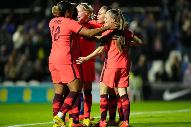 Jess Park (right) netted England’s fourth (Jose Breton/AP)