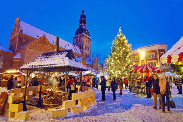 Christmas market in Riga’s Old Town (Roman Babakin/Alamy/PA)