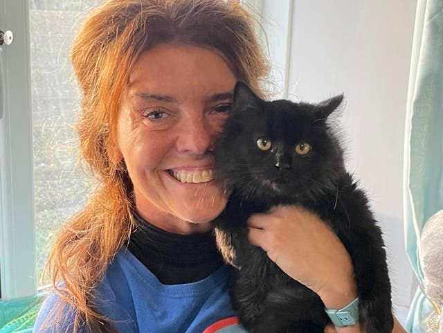 <p>Samantha Archibald and kitten Arya, nursed back to health from being emaciated</p>