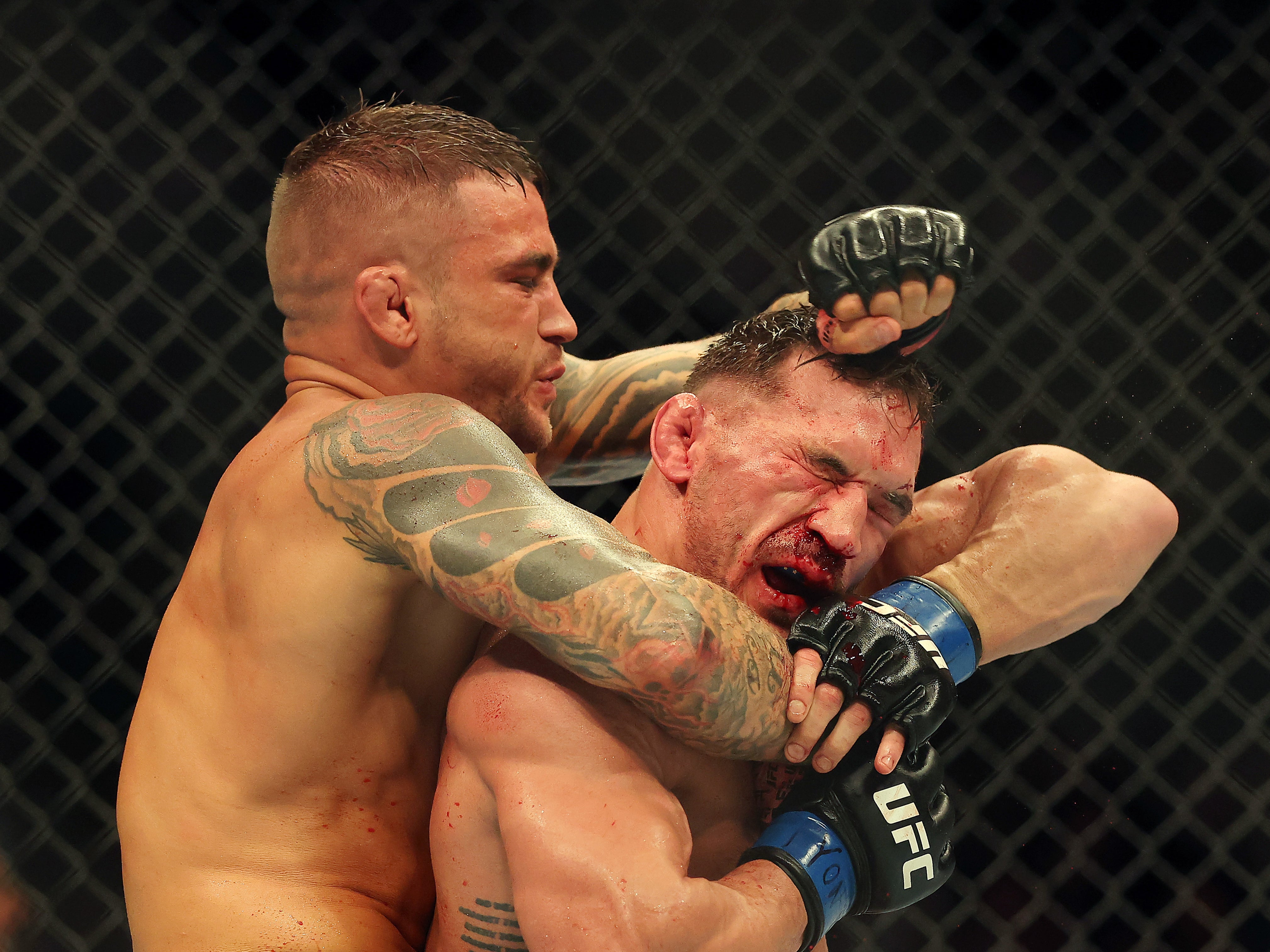 Dustin Poirier (left) won a thrilling bout with Michael Chandler