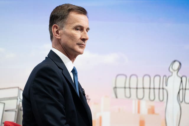 Chancellor Jeremy Hunt said everyone will be paying ‘a bit more’ in taxes (James Manning/PA)
