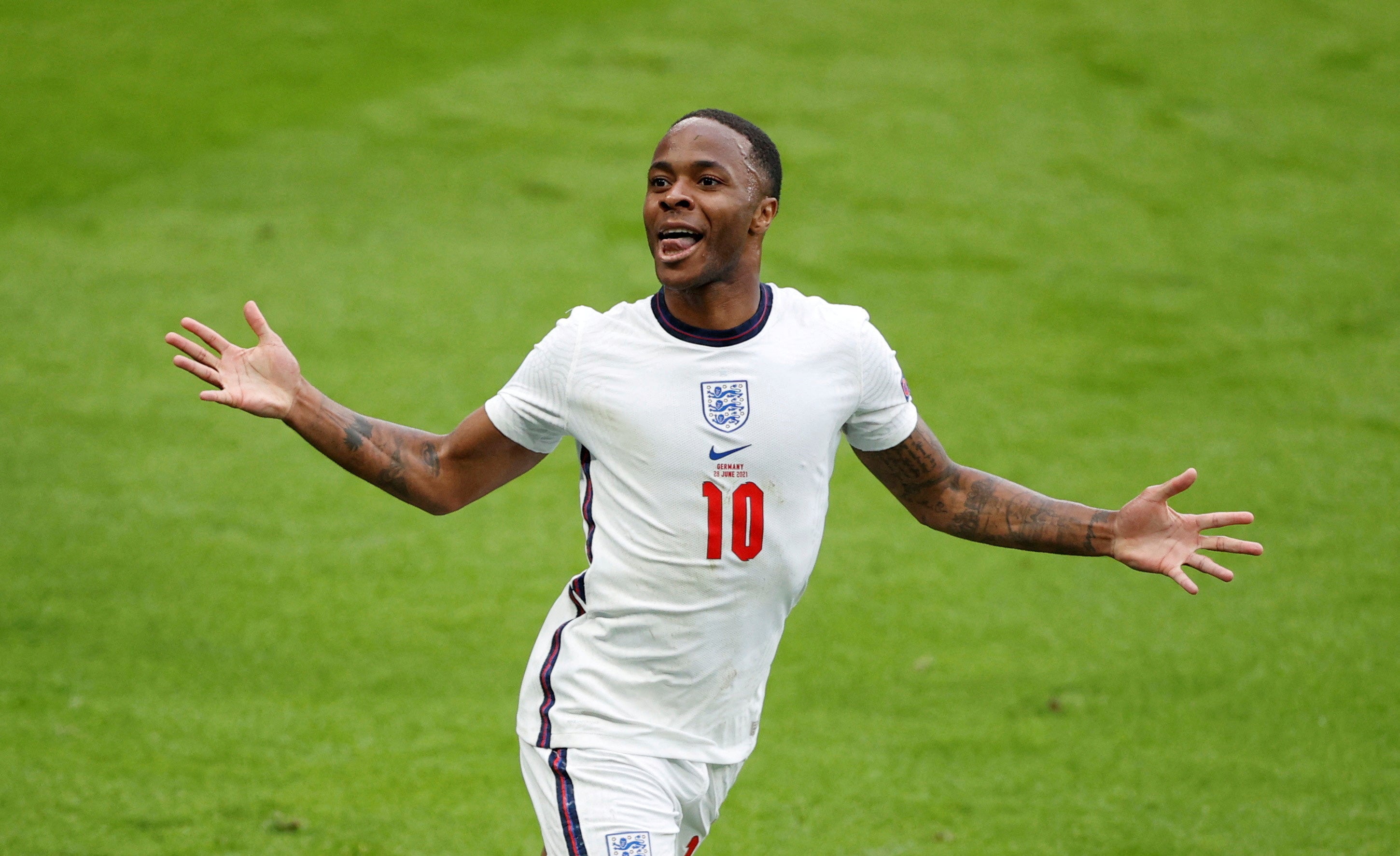 Raheem Sterling celebrates scoring against Germany at Euro 2020