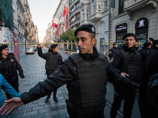 <p>Officers secure the area after the attack on Istiklal Street</p>