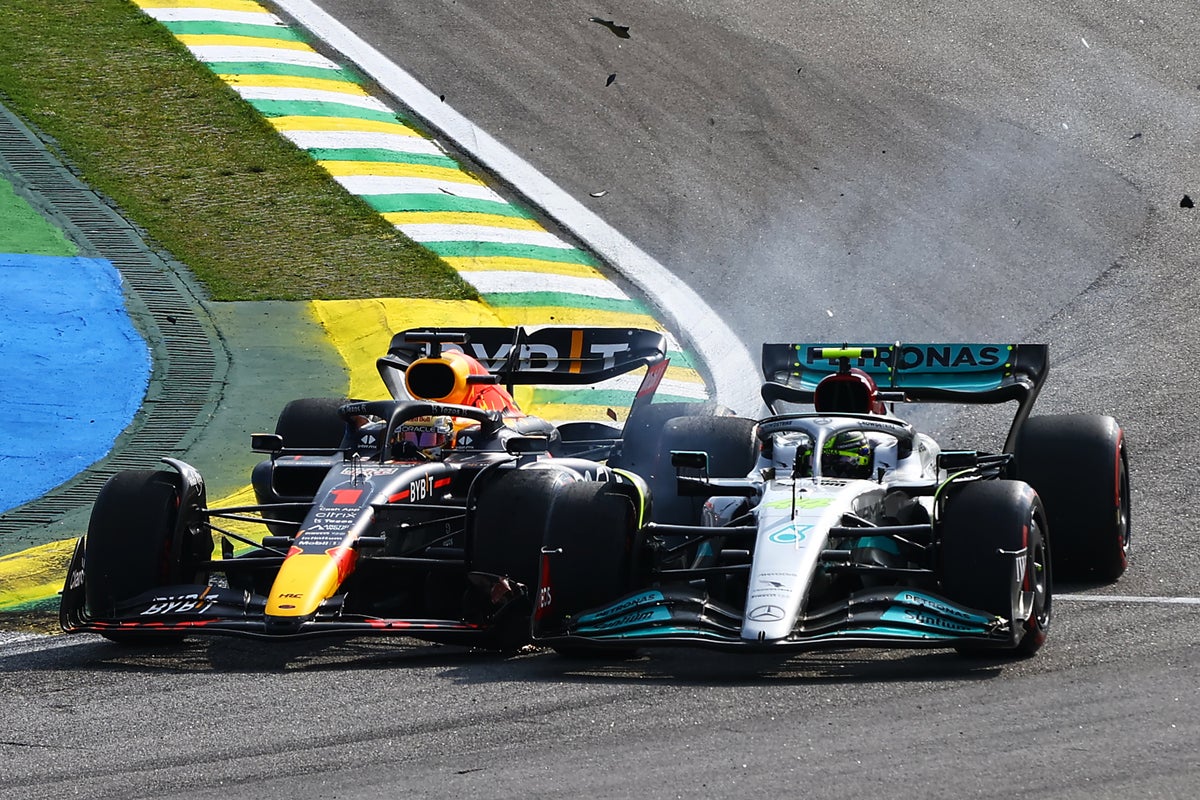 F1 Brazilian Grand Prix LIVE: George Russell leads after Lewis Hamilton collides with Max Verstappen