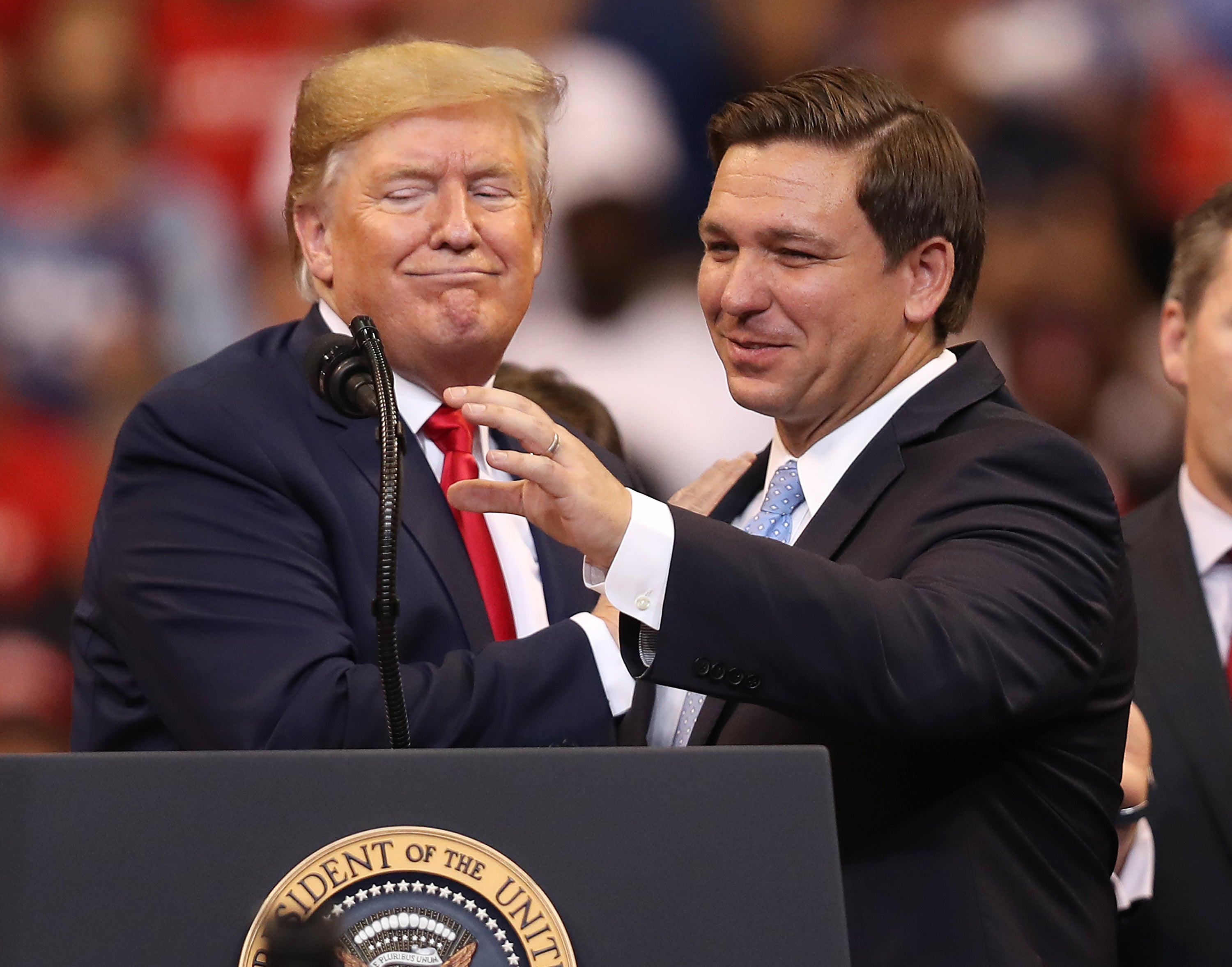 Donald Trump introduces Florida governor Ron DeSantis during a homecoming campaign rally in 2019