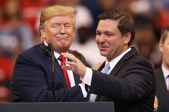<p>Donald Trump introduces Florida Governor Ron DeSantis during a homecoming campaign rally at the BB&T Center on 26 November 2019 in Sunrise, Florida.</p>