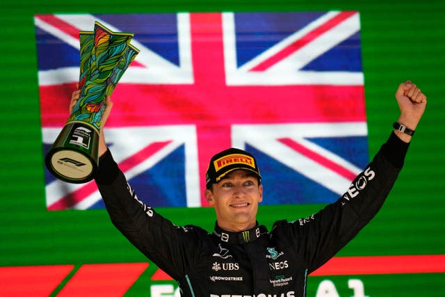 <p>George Russell celebrates his victory at the Brazilian Grand Prix (Andre Penner/AP/PA)</p>