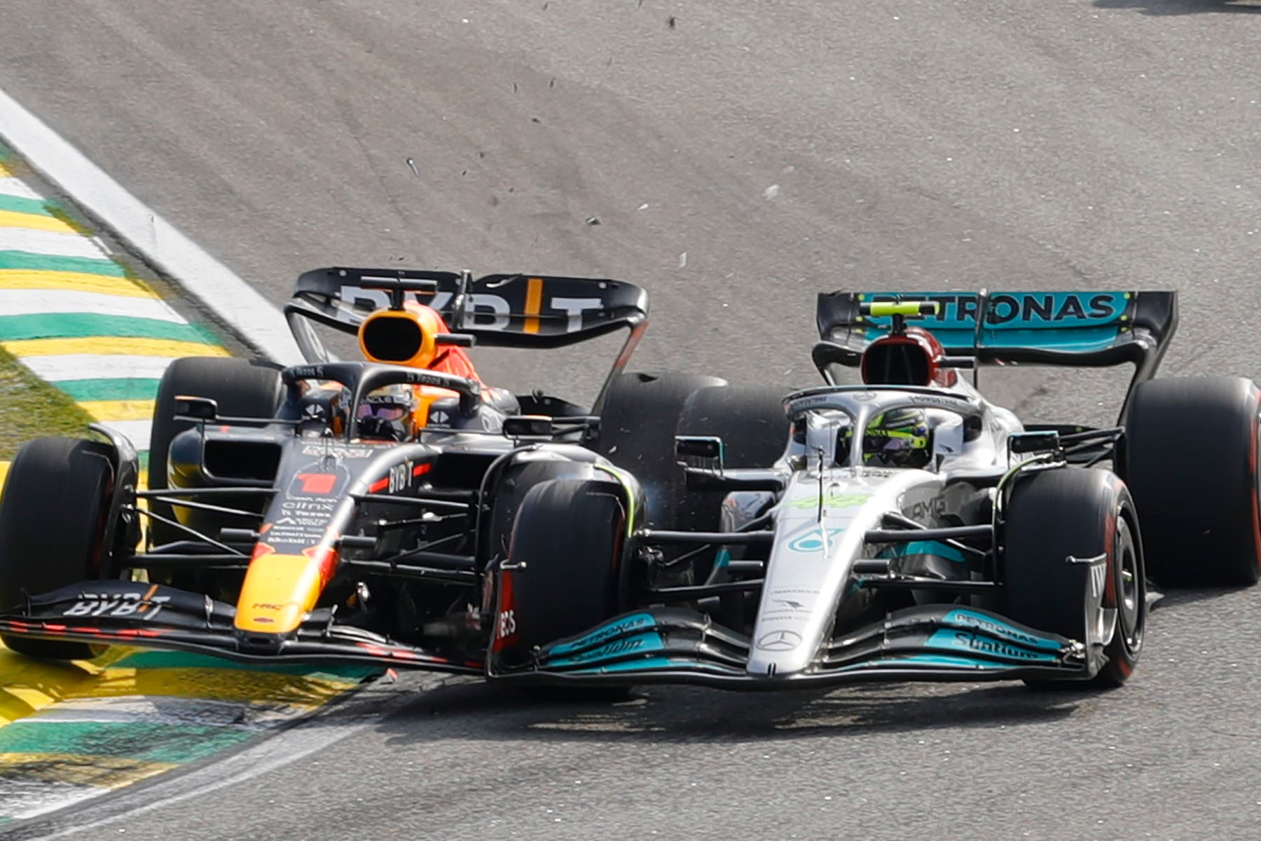 Max Verstappen and Lewis Hamilton collide in Brazil