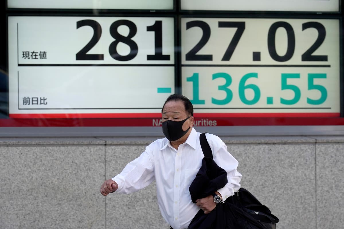 Asian benchmarks mixed as markets eye COVID, inflation risks