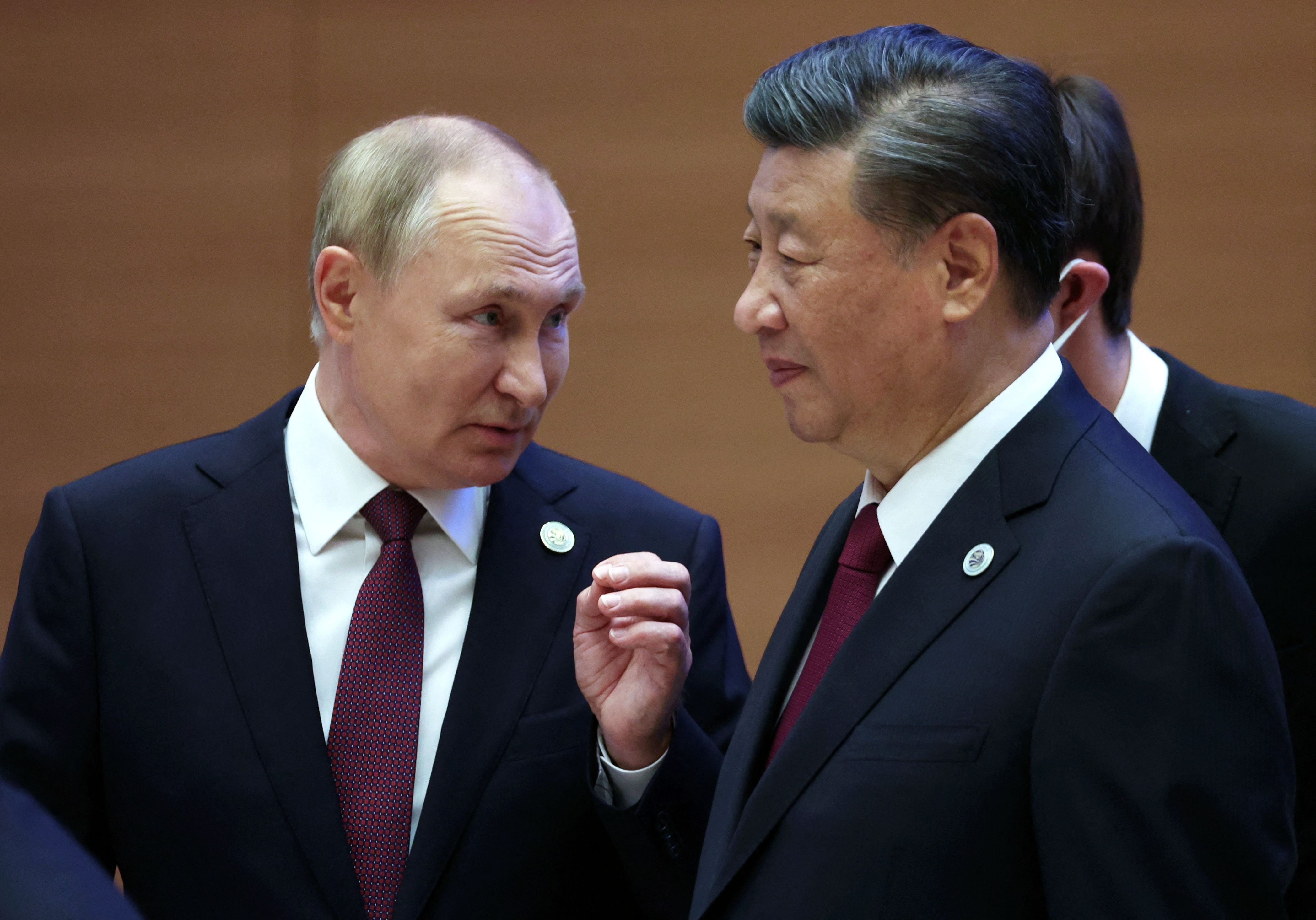 <p>File: Vladimir Putin speaks to Xi Jinping during the Shanghai Cooperation Organisation (SCO) leaders’ summit in Samarkand </p>