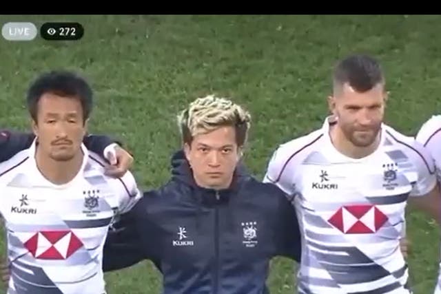 <p>Screengrab from the video shows Hong Kong team’s rugby players standing in line while protest anthem plays in South Korea stadium </p>