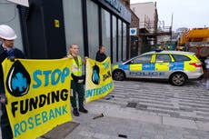 Two arrested after bank windows smashed in climate protest