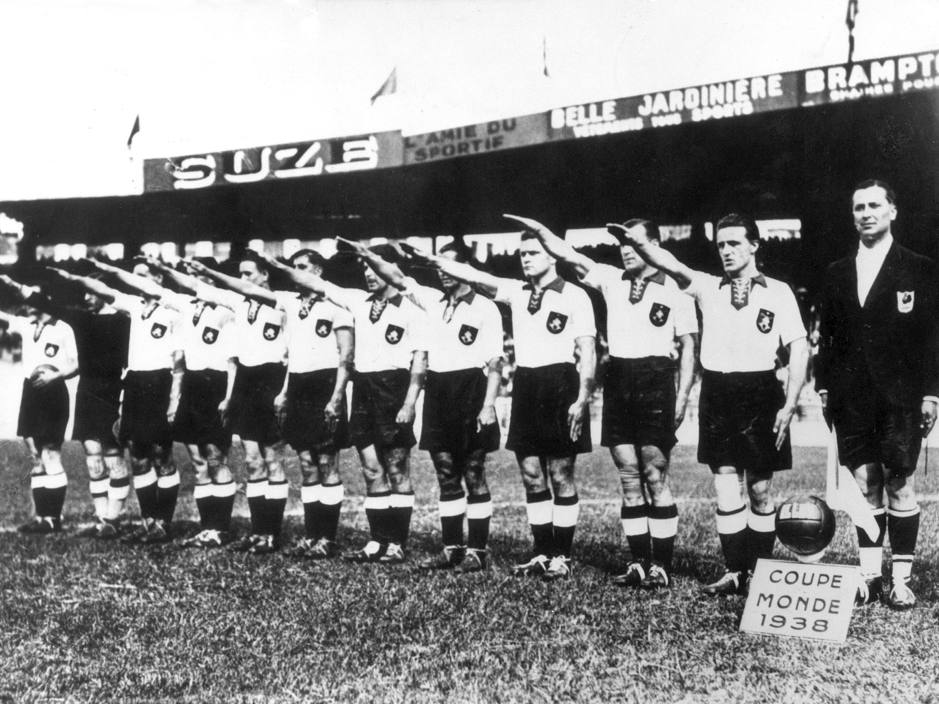 The Germany team perform a Nazi salute during the 1938 World Cup