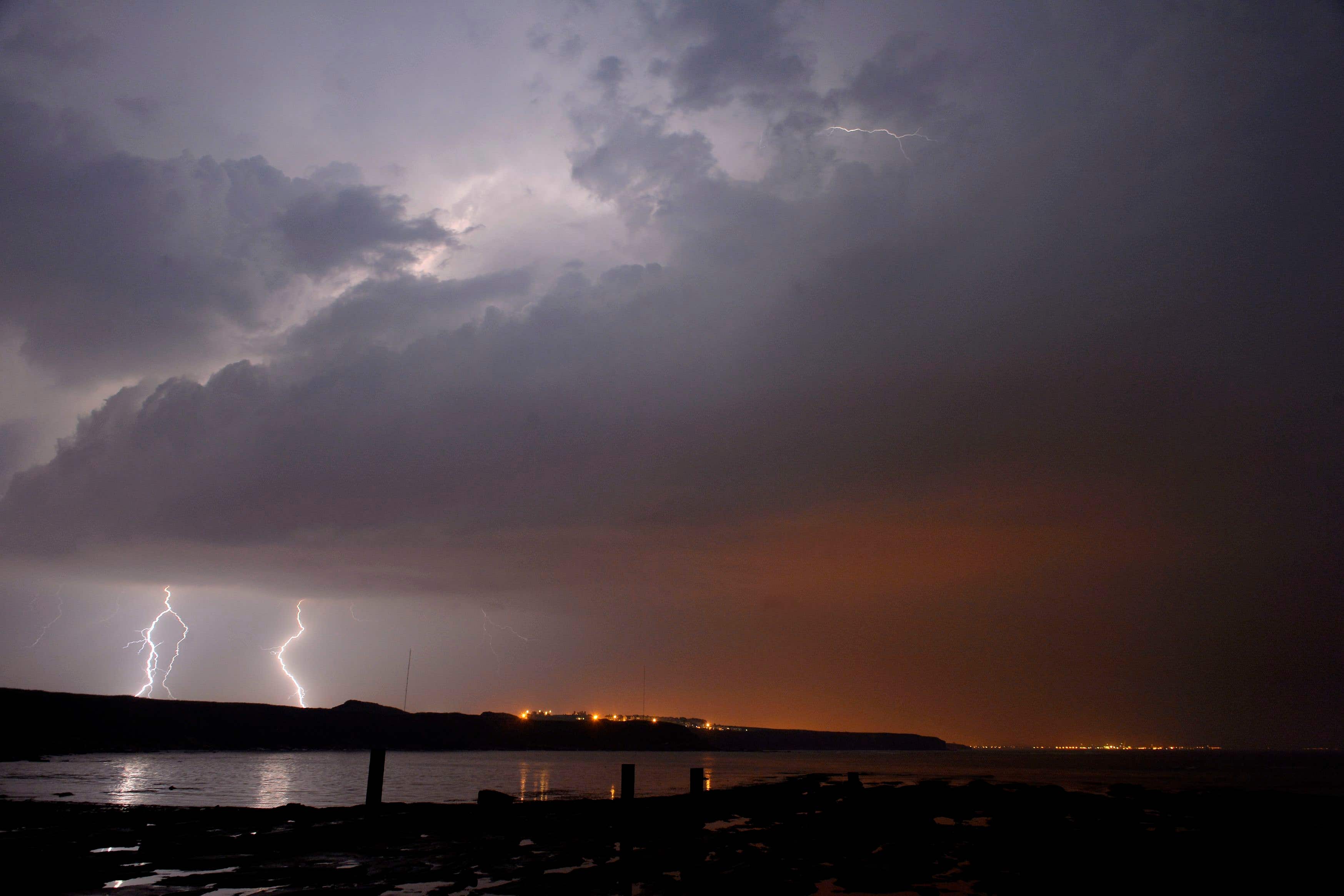 The UK’s unseasonably warm weather is set to end (Owen Humphreys/PA)