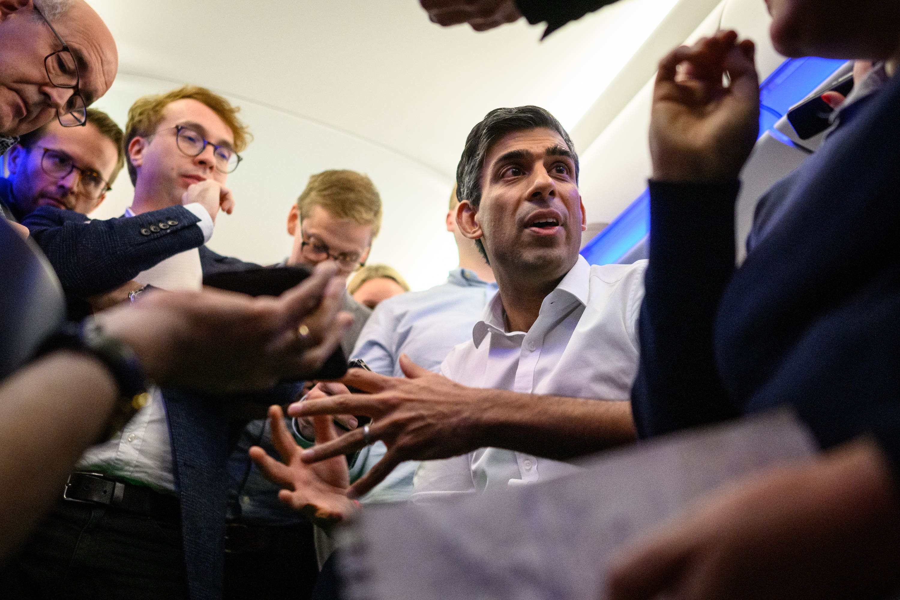 Rishi Sunak speaks to reporters on the flight to Bali for the G20 summit