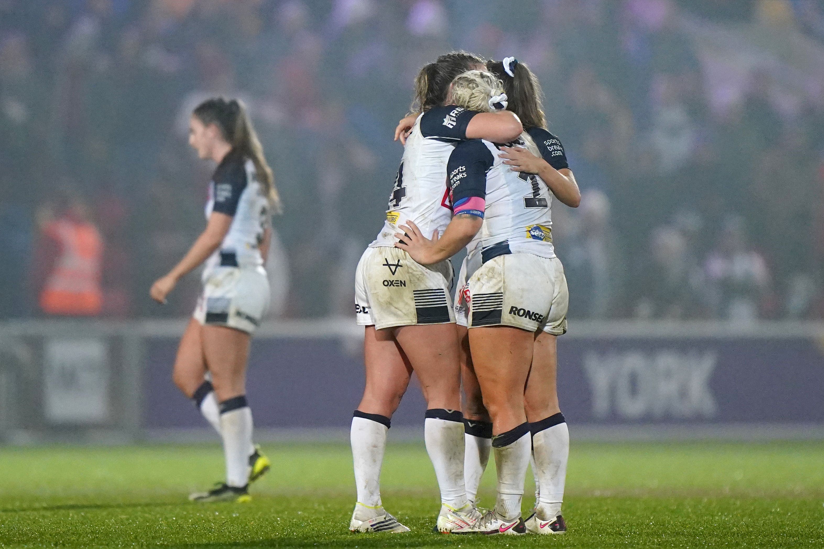 England players console each other after defeat to New Zealand (Tim Goode/PA).