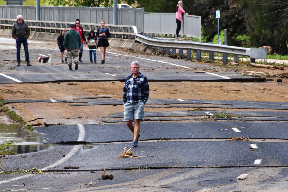 Waters again threaten Australia town flooded 2 weeks ago