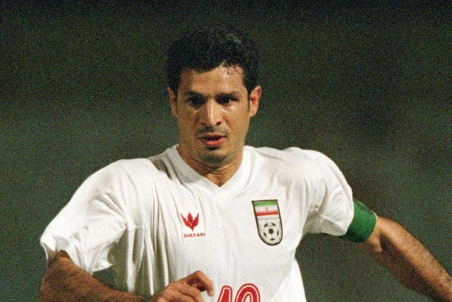 <p>Ali Daei in action for Iran in a qualifier for the 2002 World Cup</p>