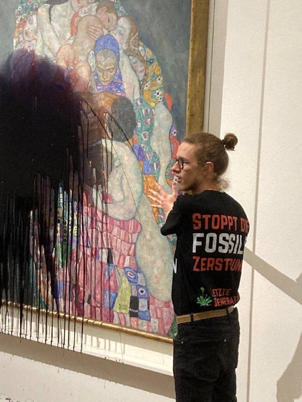 Activist from Last Generation glued himself to the screen protecting the painting